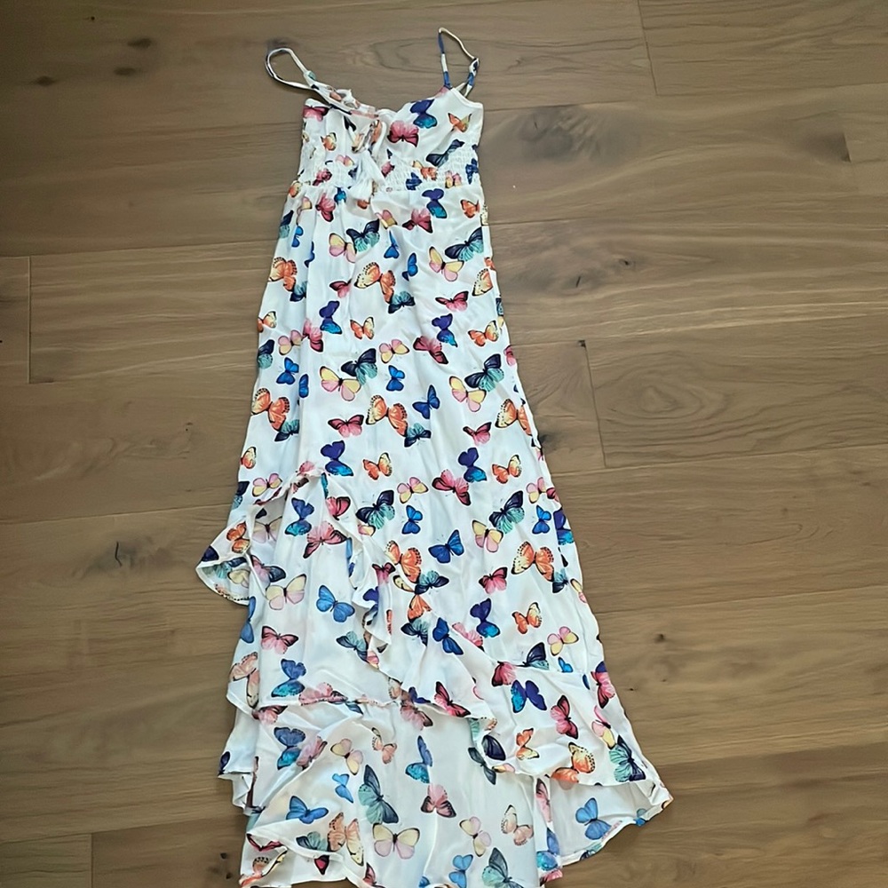 White dress with butterflies.